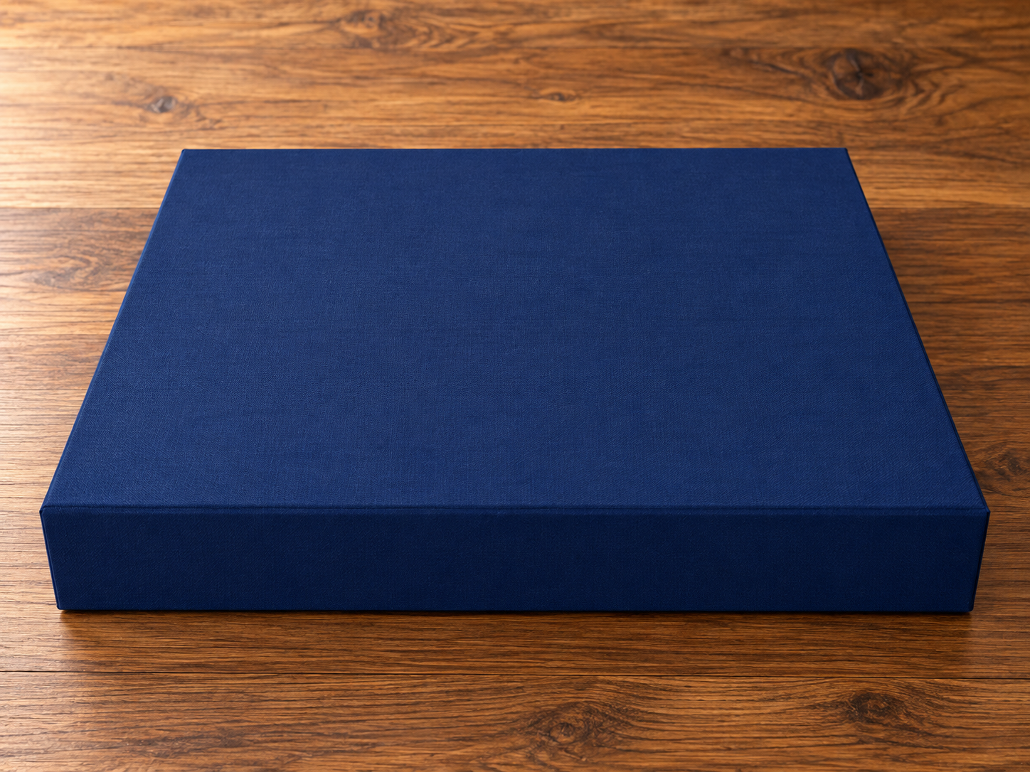 Custom navy blue linen rigid box exterior view by Luxe Box
