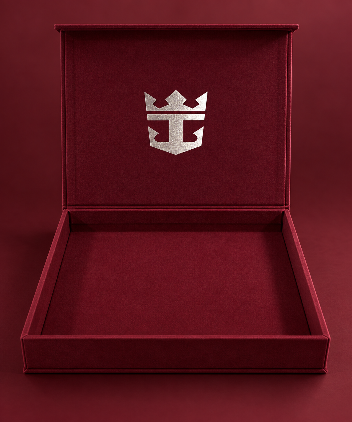 Custom velvet rigid box open with silver foil logo on interior lid by Luxe Box